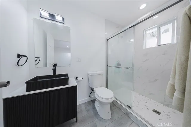 a view of a pathway of a house with wooden floor