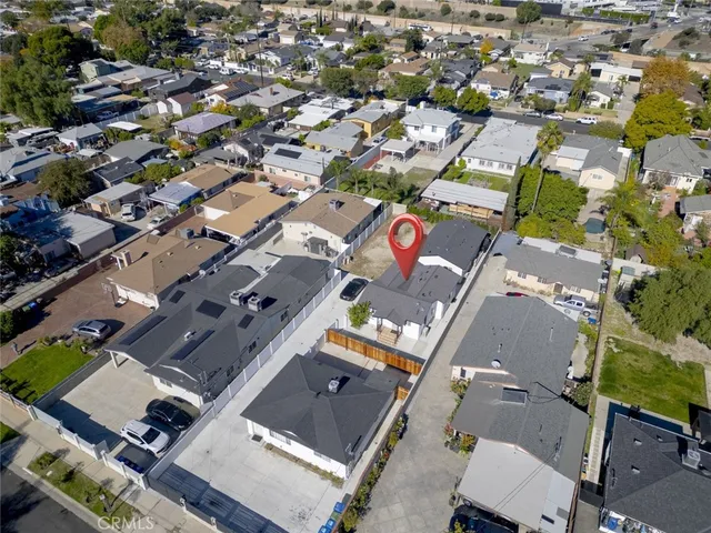 an aerial view of a city with lots of residential buildings