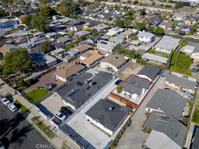 an aerial view of residential house with parking space