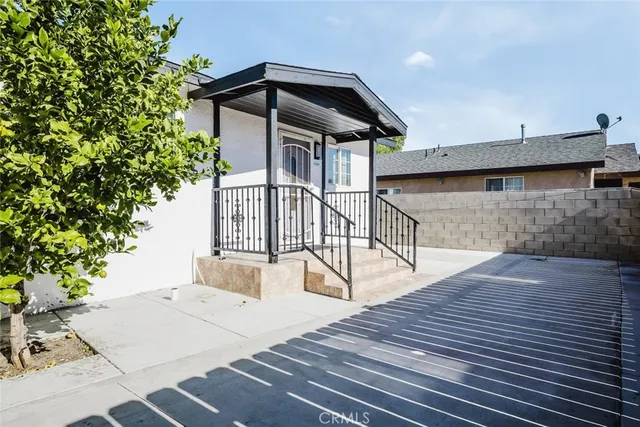 a view of a balcony with wooden floor