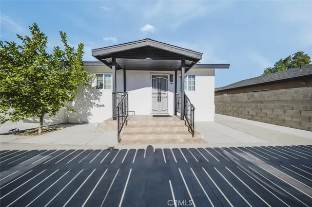 a view of a house with wooden floor