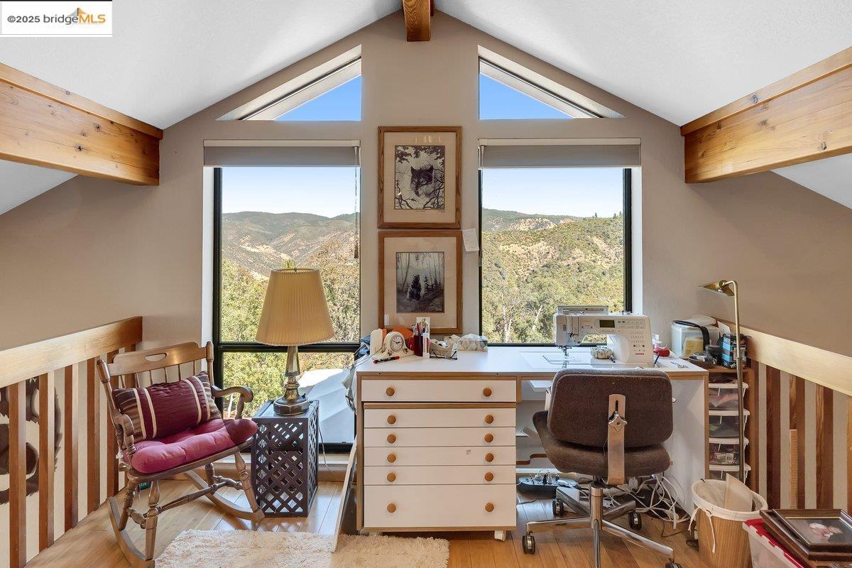 13700 Clements Road Groveland, CA 95321 - Photo 40 of 58 a view of a workspace with furniture and a window