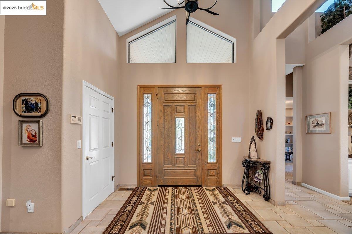 13700 Clements Road Groveland, CA 95321 - Photo 4 of 58 a view of a livingroom with wooden floor and a large window