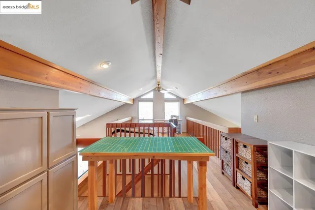 a utility room with furniture and parked car