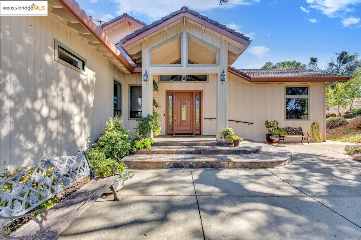13700 Clements Road Groveland, CA 95321 - Photo 43 of 58 a view of a building with potted plants