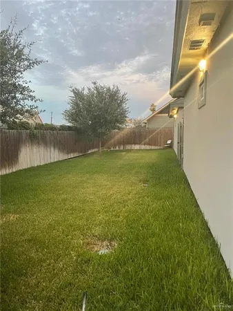 a view of a lake with a big yard