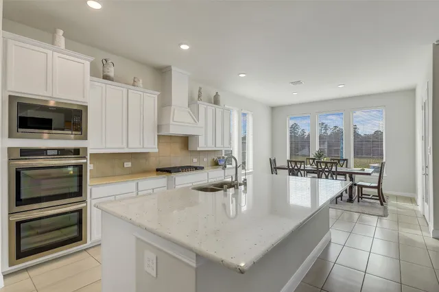 a large kitchen with cabinets