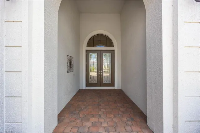 a view of a room that has a window in it