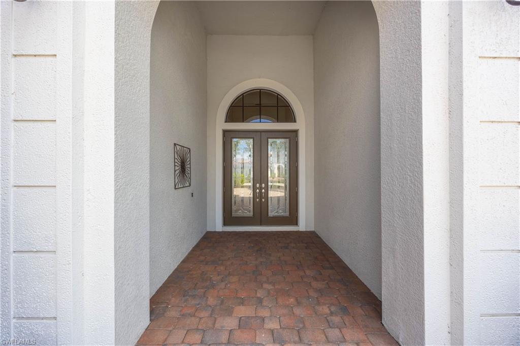 8950 Shenendoah Circle Naples, FL 34113 - Photo 2 of 48 a view of a room that has a window in it