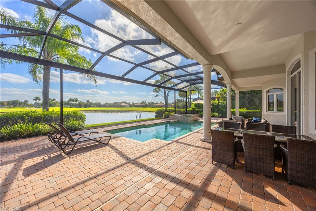 8950 Shenendoah Circle Naples, FL 34113 - Photo 27 of 48 a view of swimming pool with outdoor seating