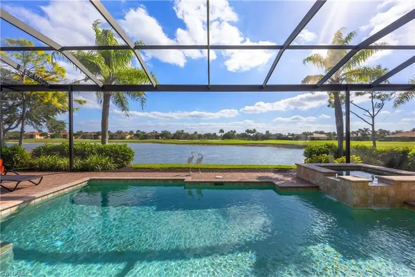 a view of a backyard with sitting area