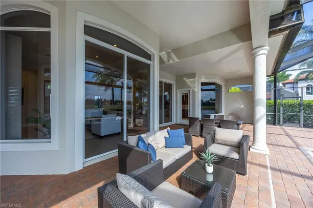 a view of a backyard with sitting area and porch
