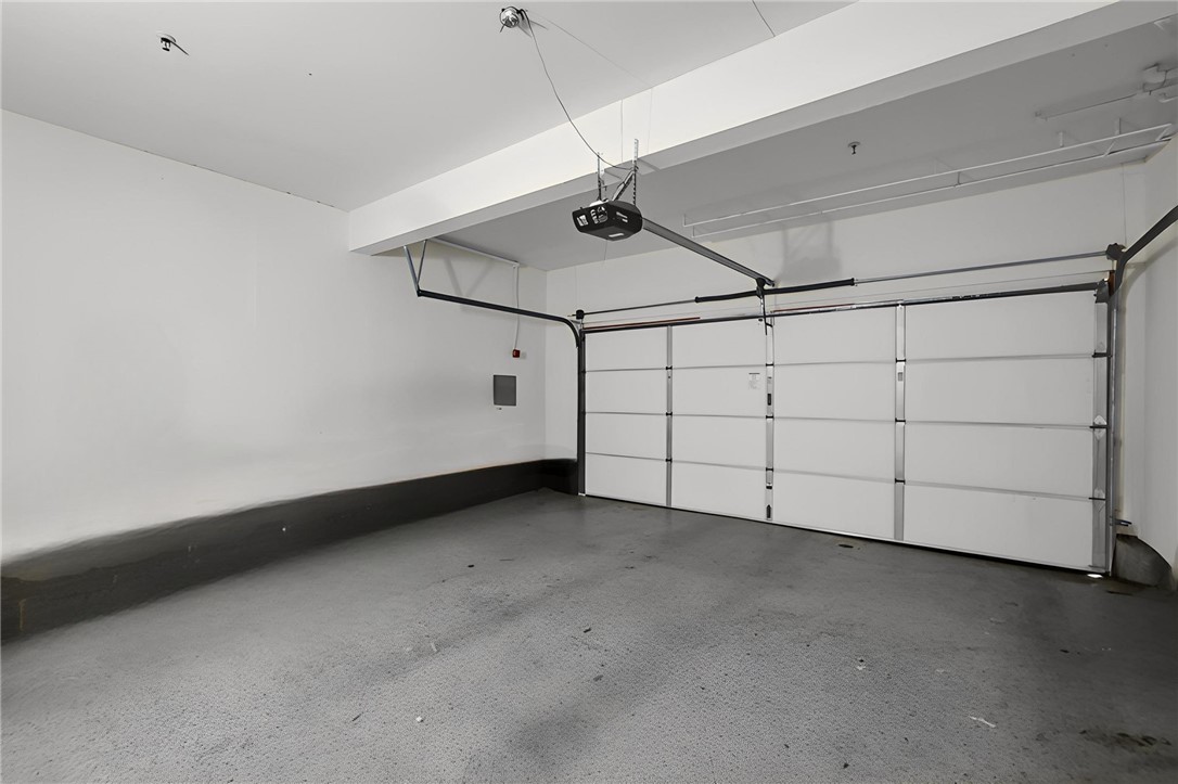 73 Cartier Aisle Irvine, CA 92620 - Photo 18 of 19 a view of a garage