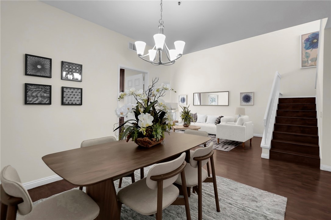 73 Cartier Aisle Irvine, CA 92620 - Photo 6 of 19 a view of a dining room with furniture and wooden floor