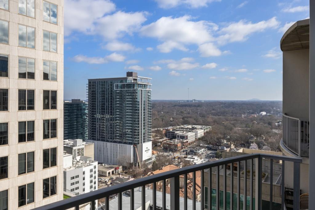 943 Peachtree Street Northeast, Unit 2009 Atlanta, GA 30309 - Photo 16 of 57 a view of a city from a balcony