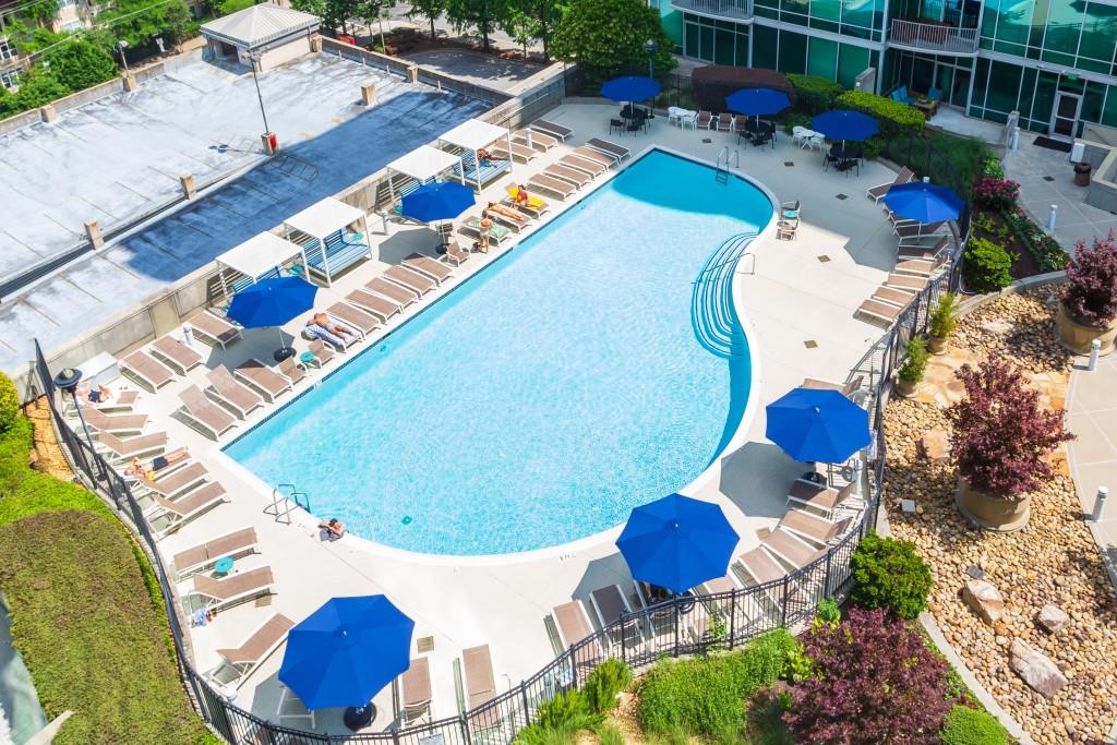 943 Peachtree Street Northeast, Unit 2009 Atlanta, GA 30309 - Photo 49 of 57 a view of swimming pool with outdoor seating