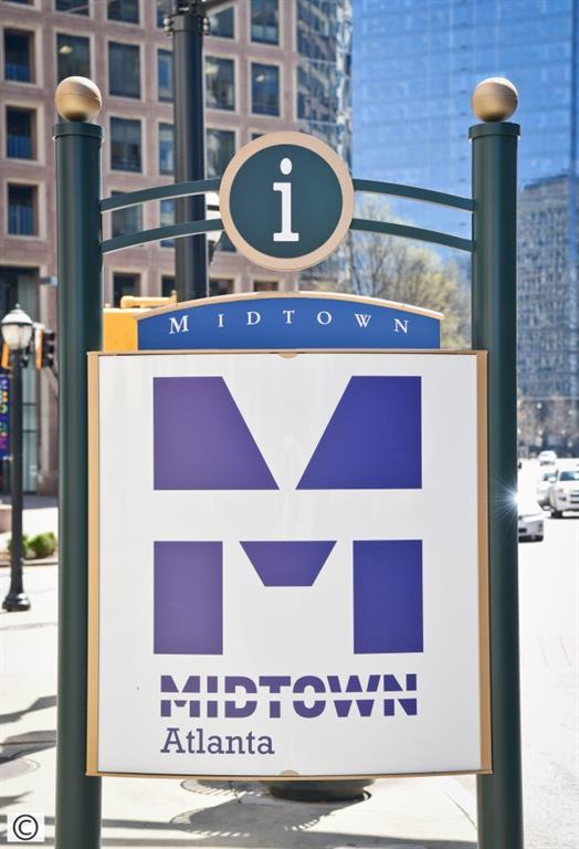 943 Peachtree Street Northeast, Unit 2009 Atlanta, GA 30309 - Photo 57 of 57 a front view of a building with entryway