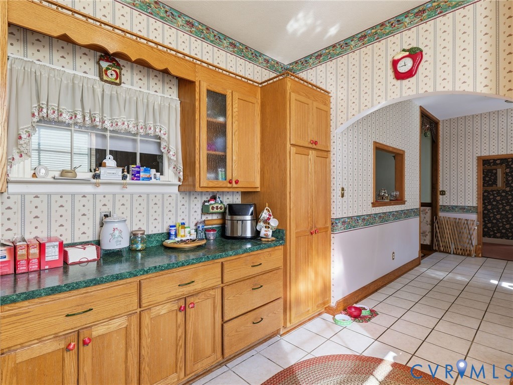 11152 Cross County Road Mineral, VA 23117 - Photo 5 of 29 a kitchen with granite countertop a sink and cabinets