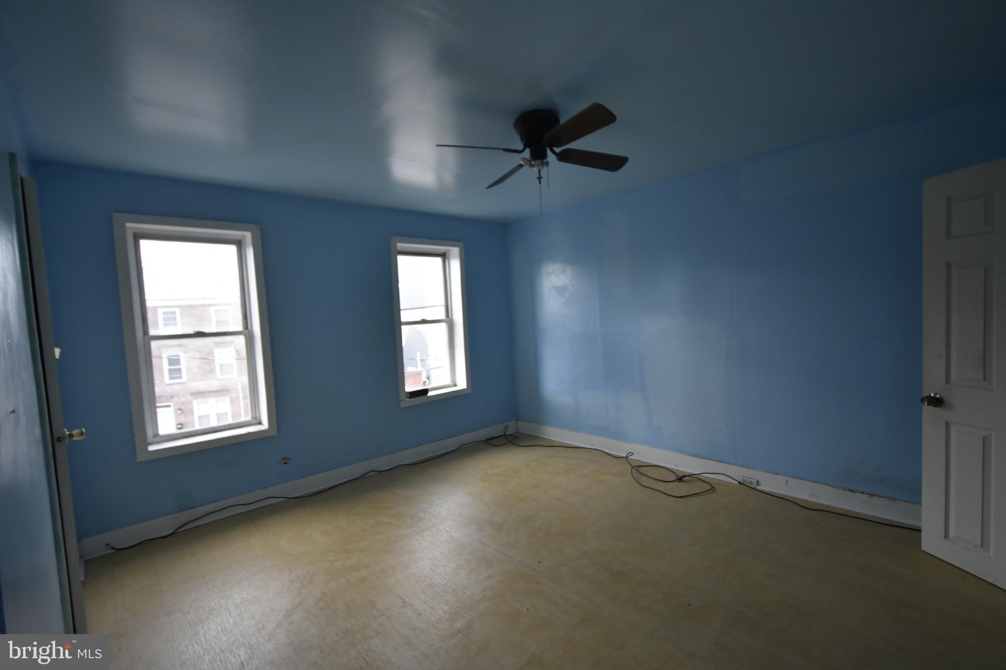 1653 Cadwallader Street Philadelphia, PA 19122 - Photo 27 of 34 an empty room with windows