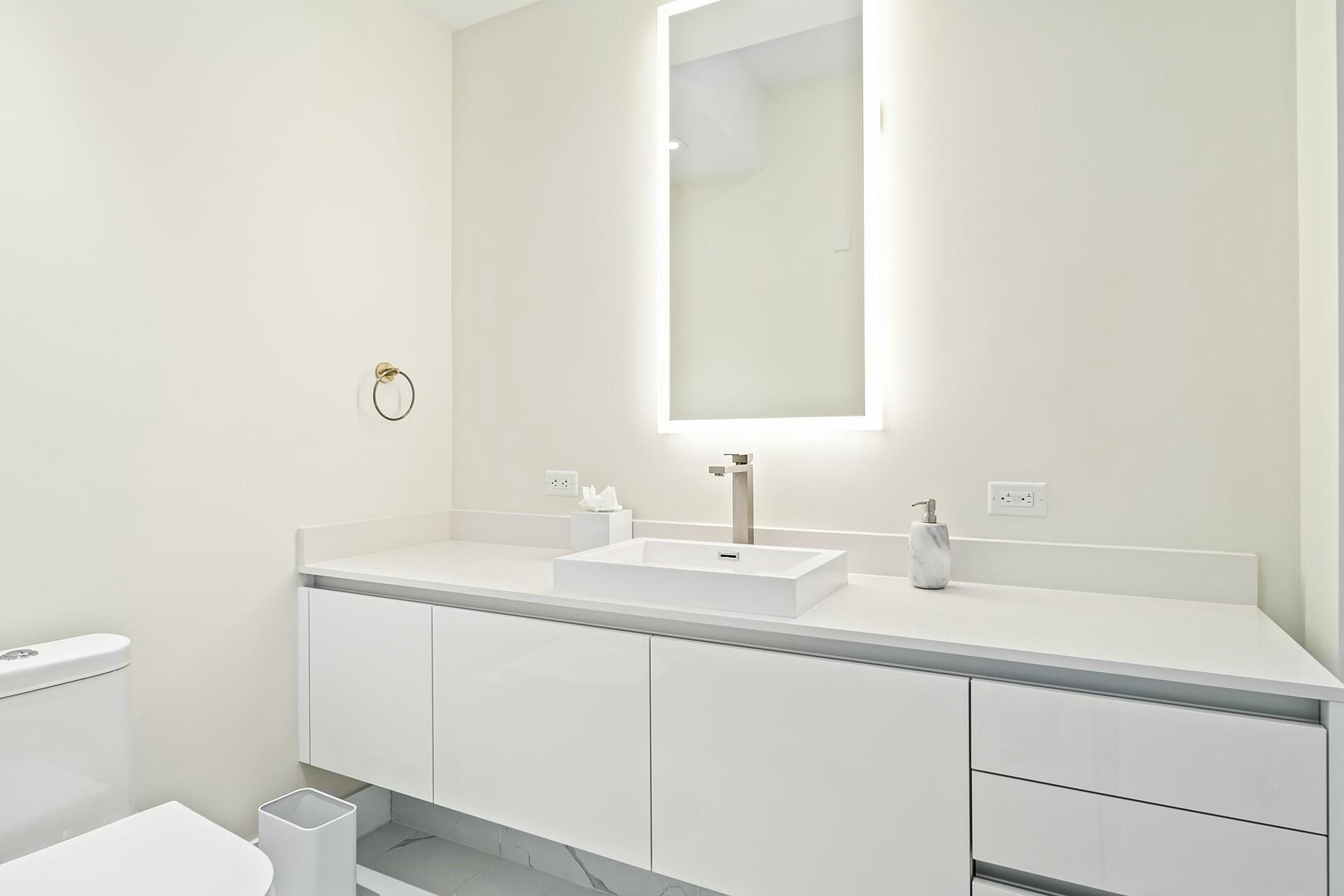 3100 North Ocean Drive, Unit H1409 Singer Island, FL 33404 - Photo 12 of 31 a bathroom with a sink and a toilet