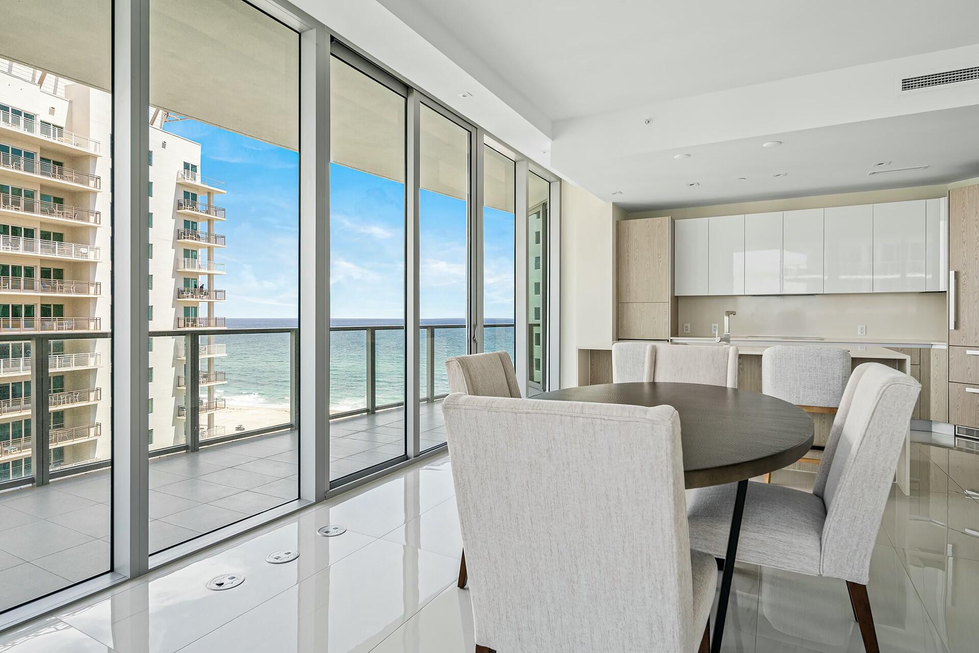 3100 North Ocean Drive, Unit H1409 Singer Island, FL 33404 - Photo 5 of 31 a view of kitchen with furniture and large window