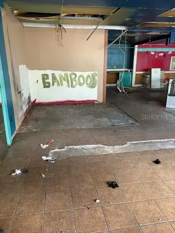 a view of store with outdoor seating