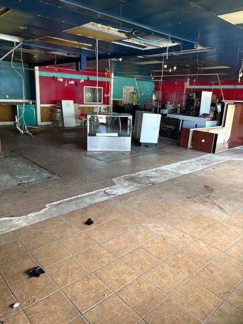 4560 Commercial Way Spring Hill, FL 34606 - Photo 4 of 15 a view of store with outdoor seating