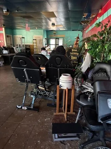 a room with furniture and a flat screen tv