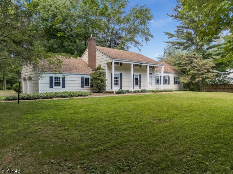 478 Charlestown Road Hampton, NJ 08827 - Photo 1 of 44 a front view of a house with a garden