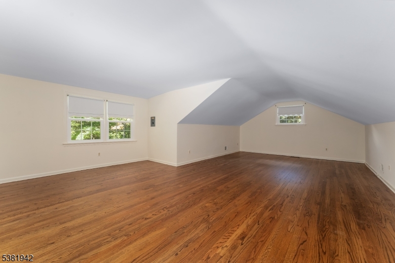 478 Charlestown Road Hampton, NJ 08827 - Photo 22 of 44 an empty room with wooden floor and windows