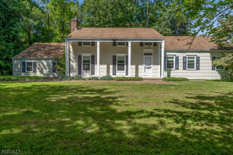 478 Charlestown Road Hampton, NJ 08827 - Photo 29 of 44 a front view of a house with a garden