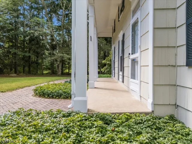 a view of a back yard of the house
