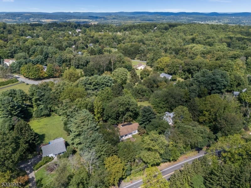478 Charlestown Road Hampton, NJ 08827 - Photo 41 of 44 an aerial view of a house with a yard