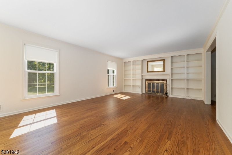 478 Charlestown Road Hampton, NJ 08827 - Photo 5 of 44 an empty room with wooden floor and windows