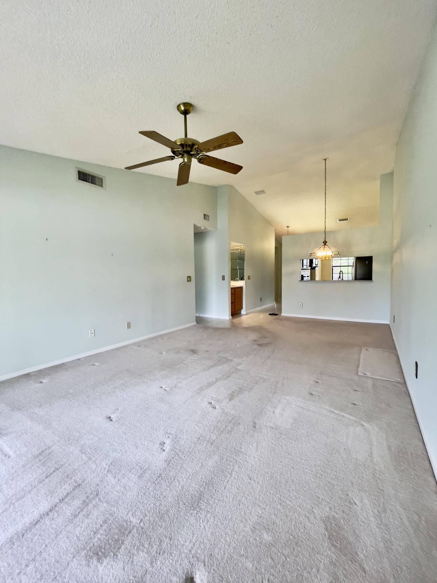 1002 Keystone Drive, Unit B Jupiter, FL 33458 - Photo 11 of 28 Large living and dining area a