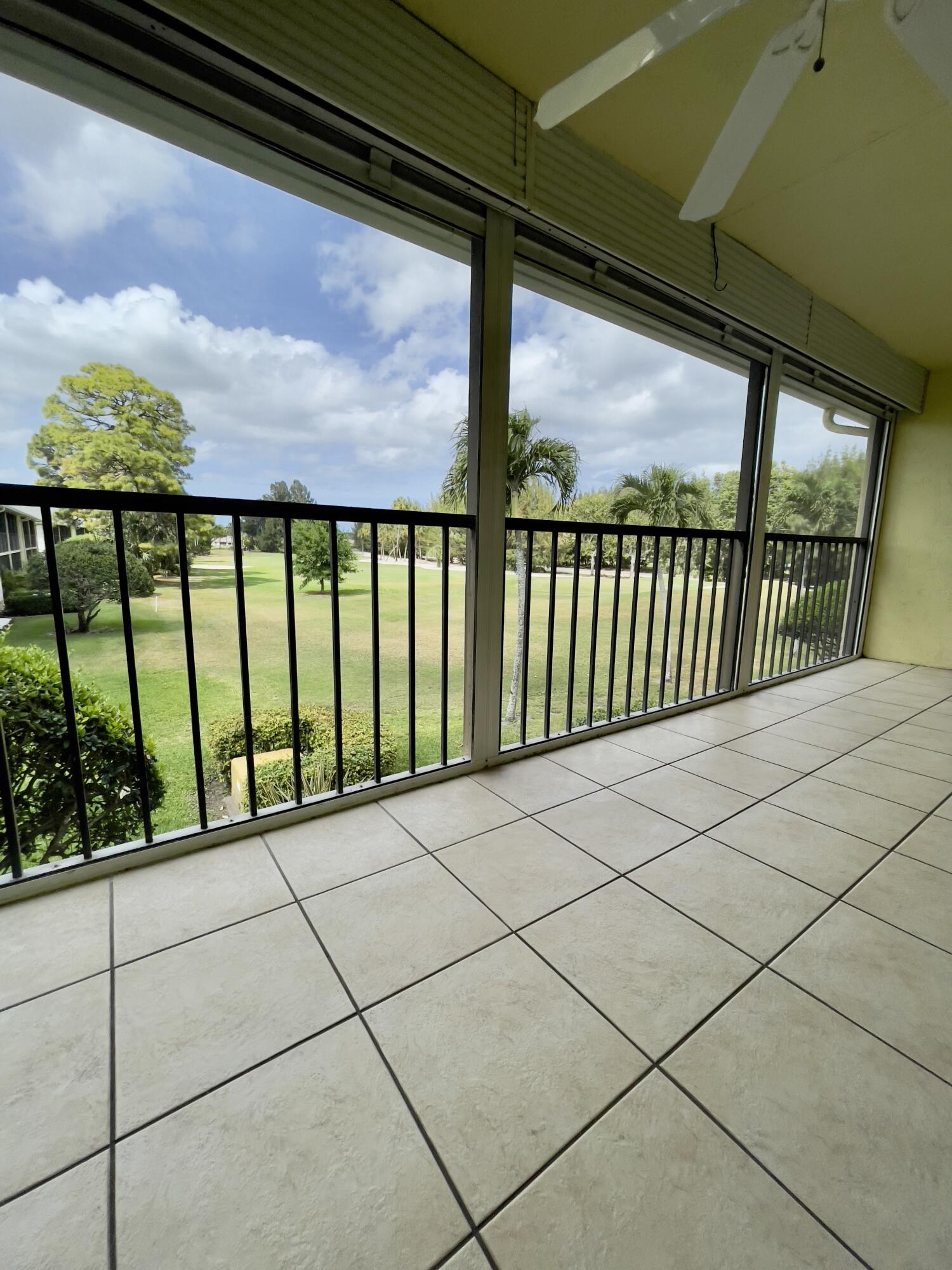 1002 Keystone Drive, Unit B Jupiter, FL 33458 - Photo 12 of 28 Large screened in patio
