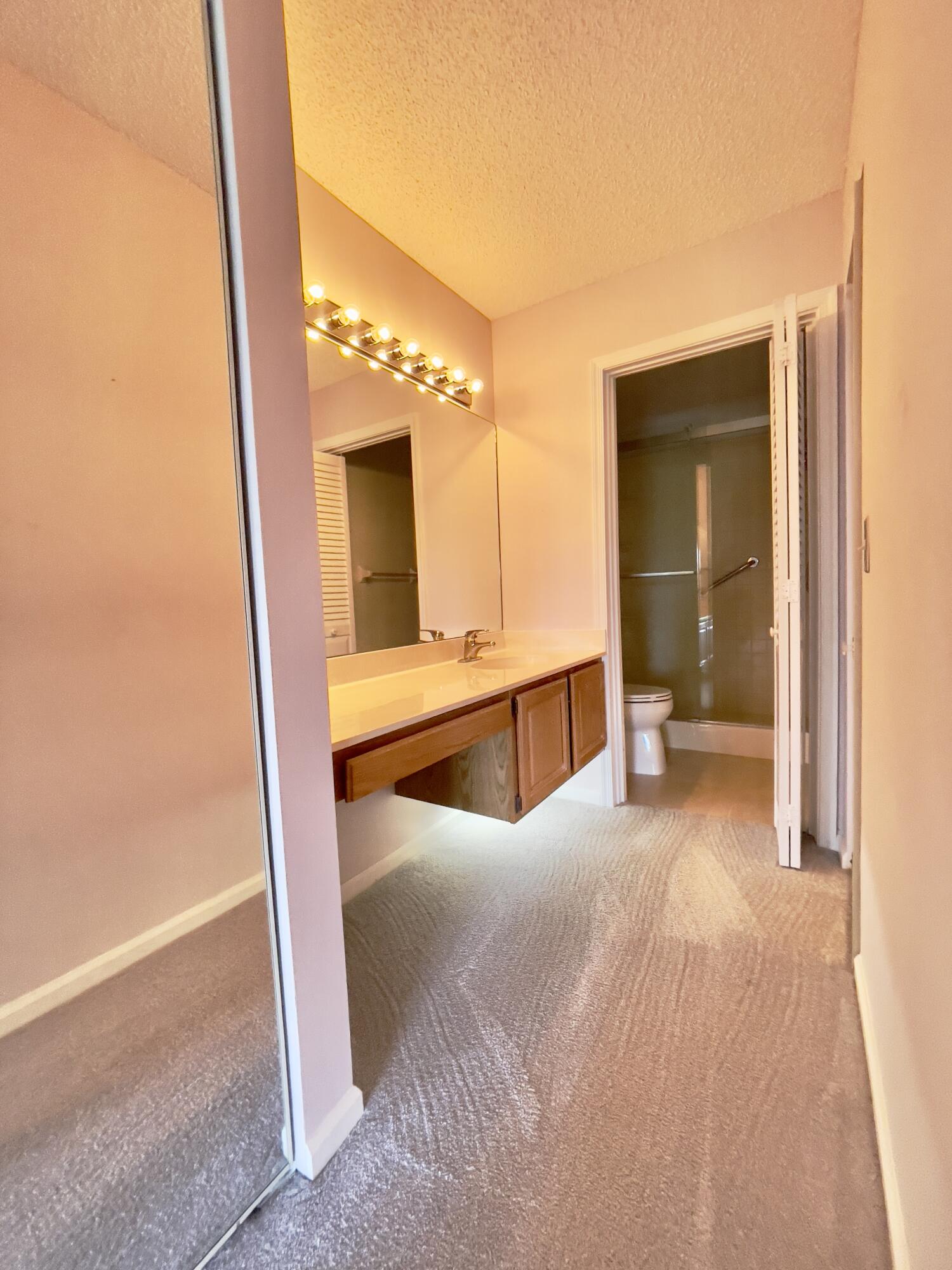 1002 Keystone Drive, Unit B Jupiter, FL 33458 - Photo 19 of 28 En suite master bathroom