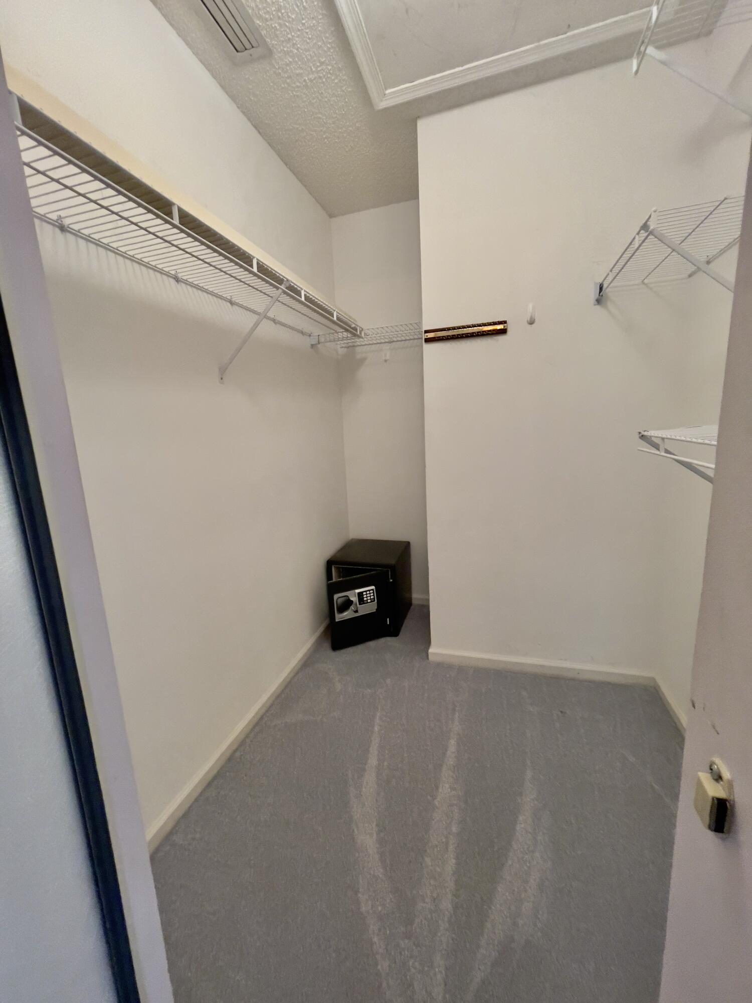 1002 Keystone Drive, Unit B Jupiter, FL 33458 - Photo 21 of 28 Walk in closet Master closet