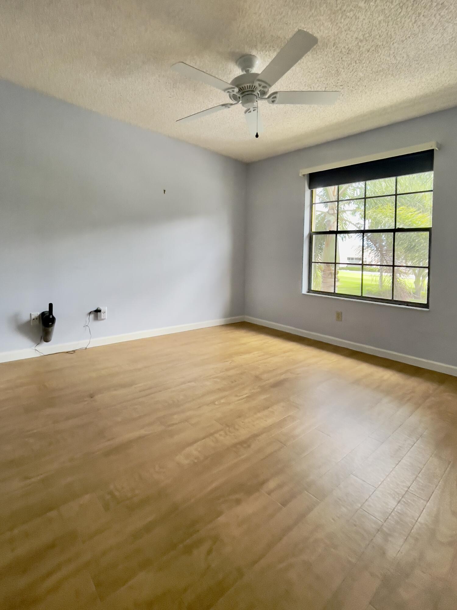 1002 Keystone Drive, Unit B Jupiter, FL 33458 - Photo 22 of 28 2nd Bedroom with walk in closet