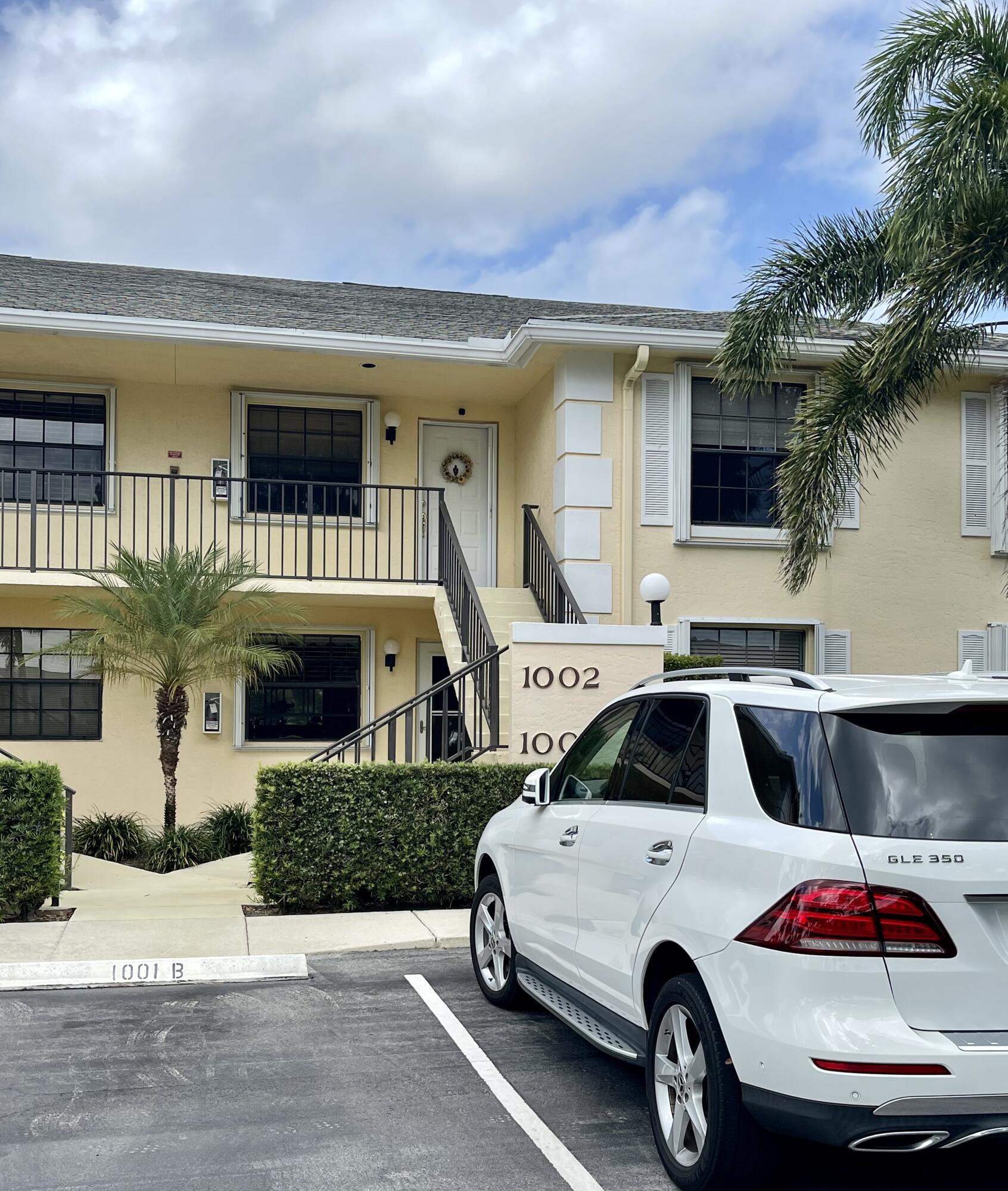 1002 Keystone Drive, Unit B Jupiter, FL 33458 - Photo 5 of 28 Designated parking spot at front door