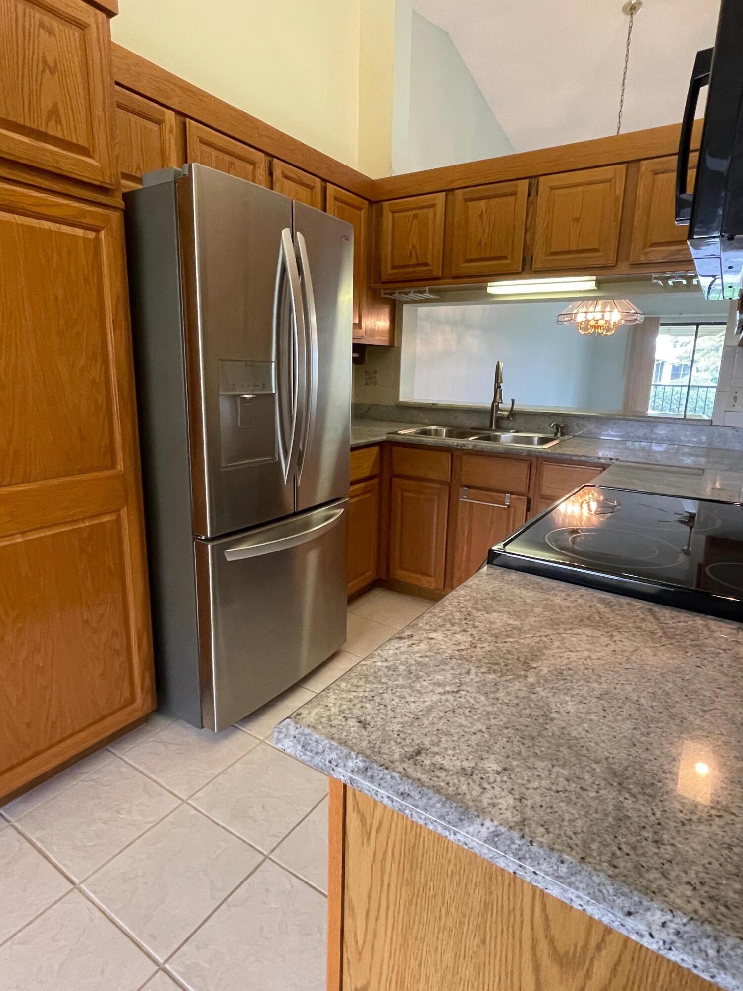 1002 Keystone Drive, Unit B Jupiter, FL 33458 - Photo 6 of 28 Granite counter tops