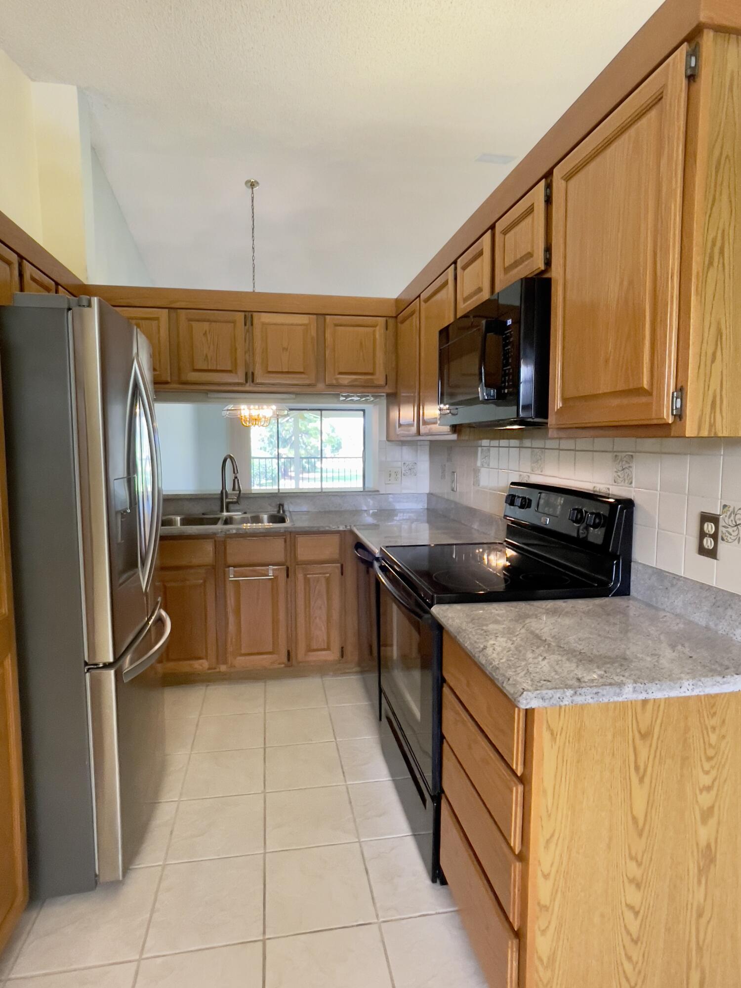 1002 Keystone Drive, Unit B Jupiter, FL 33458 - Photo 7 of 28 Updated appliances