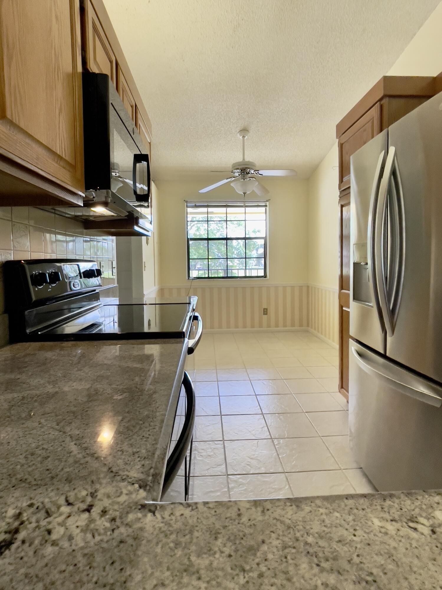 1002 Keystone Drive, Unit B Jupiter, FL 33458 - Photo 9 of 28 IMG_0085 (1)