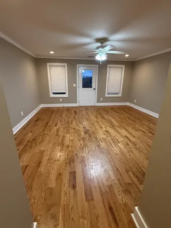 a view of an empty room and window