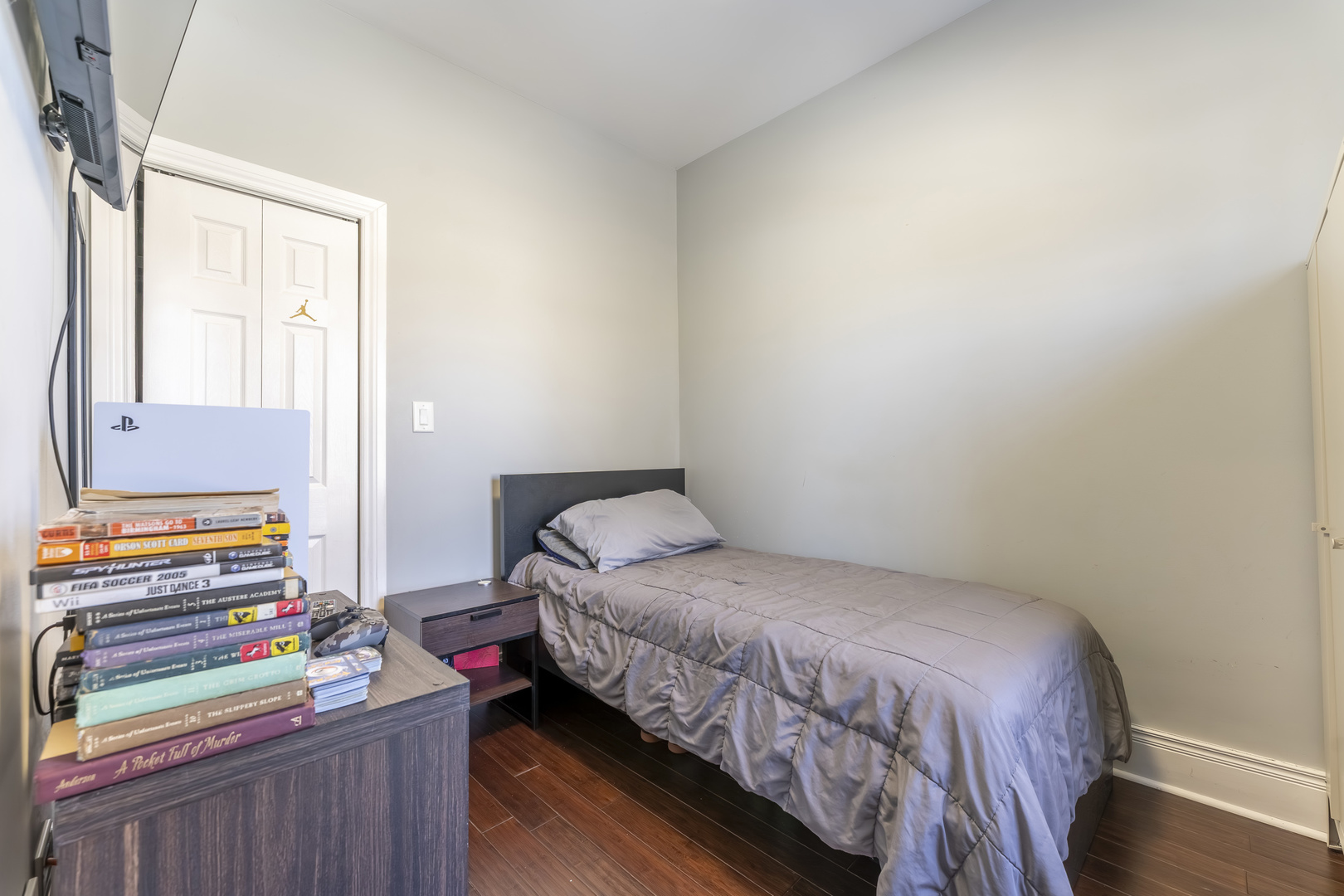 7731 45th Place Lyons, IL 60534 - Photo 11 of 21 a bedroom with a bed and a window