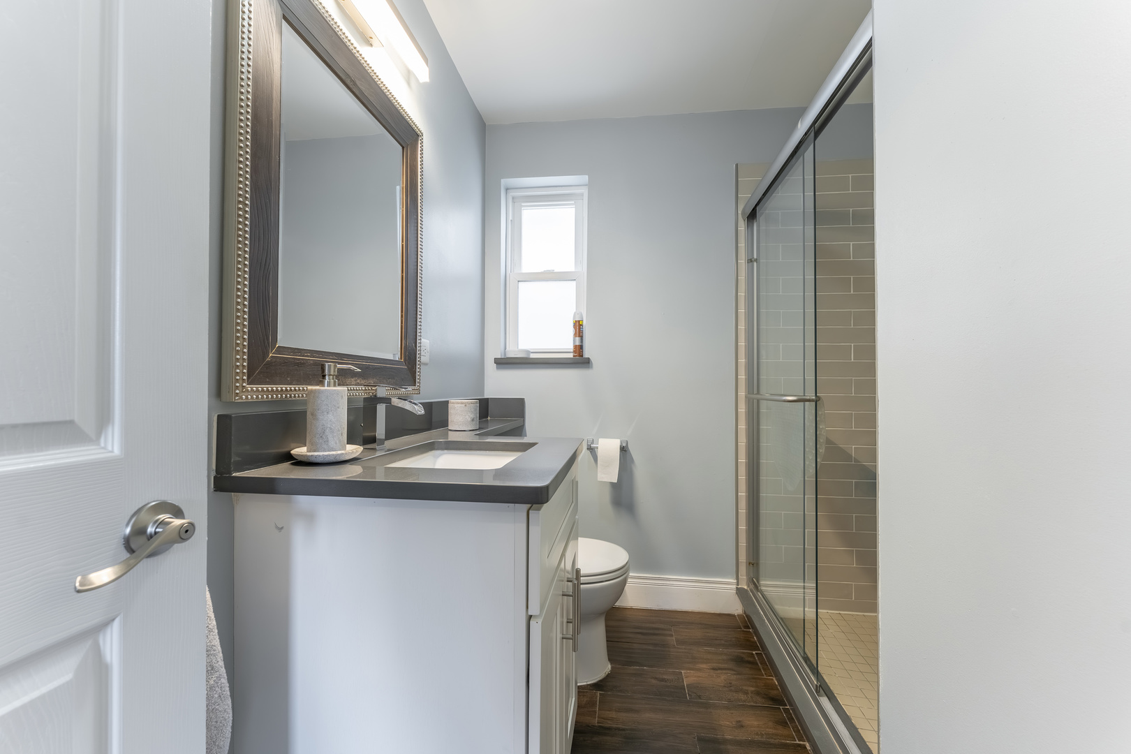 7731 45th Place Lyons, IL 60534 - Photo 12 of 21 a bathroom with a sink and a mirror