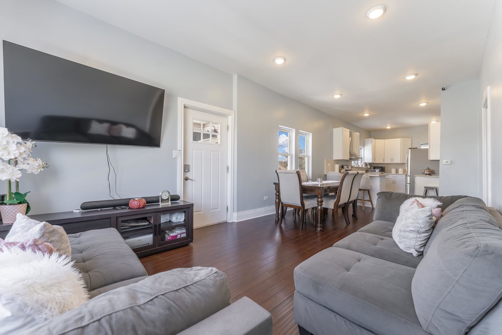 7731 45th Place Lyons, IL 60534 - Photo 2 of 21 a living room with furniture and a flat screen tv