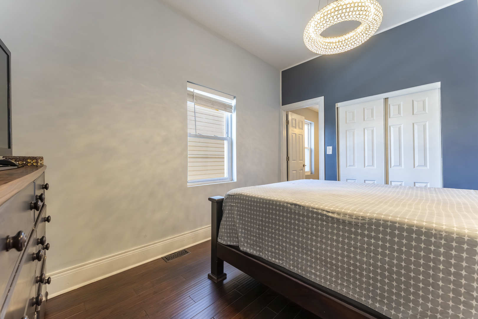 7731 45th Place Lyons, IL 60534 - Photo 8 of 21 a bedroom with a bed and a window
