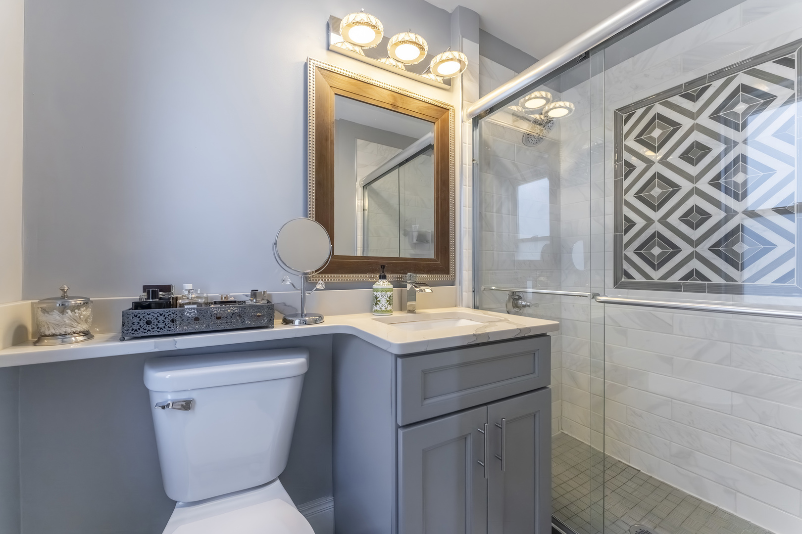 7731 45th Place Lyons, IL 60534 - Photo 10 of 21 a bathroom with a toilet sink and mirror
