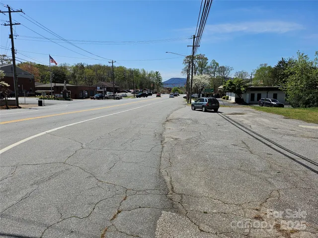 a view of a street with houses
